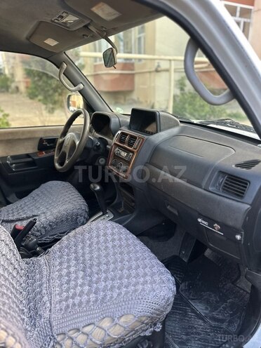 Mitsubishi Pajero io 2001, 300,000 km - 2.0 l - Bakı