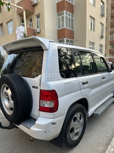 Mitsubishi Pajero io 2001, 300,000 km - 2.0 l - Bakı