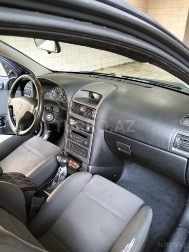 Opel Astra 2003, 280,000 km - 1.6 л - Qax