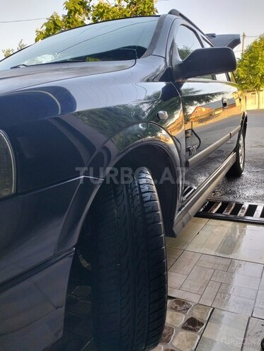 Opel Astra 2003, 280,000 km - 1.6 л - Qax