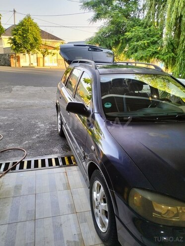 Opel Astra 2003, 280,000 km - 1.6 л - Qax