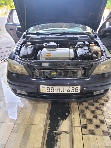 Opel Astra 2003, 280,000 km - 1.6 л - Qax
