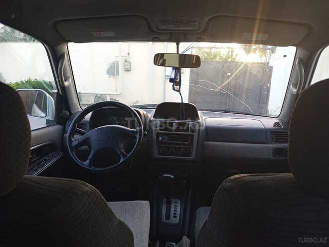 Mitsubishi Pajero io 1999, 336,000 km - 1.8 l - Bakı