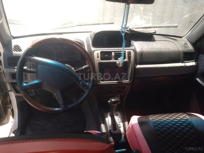 Mitsubishi Pajero io 1999, 345,000 km - 1.8 l - Bakı