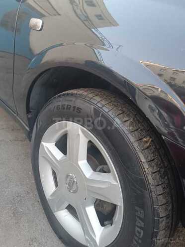 Nissan Sunny 2006, 240,000 km - 1.6 l - Bakı