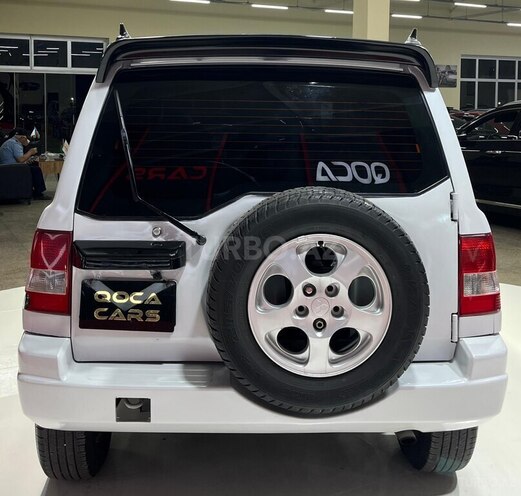 Mitsubishi Pajero io 1999, 255,555 km - 1.8 l - Sumqayıt