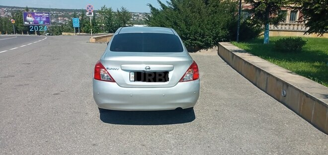 Nissan Sunny 2012, 218,000 km - 1.5 л - Qusar