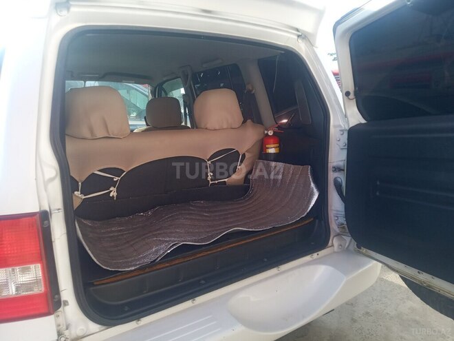 Mitsubishi Pajero io 1999, 280,000 km - 1.8 л - Bakı