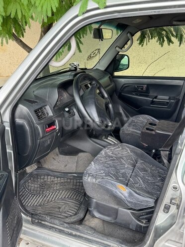 Mitsubishi Pajero io 1999, 469,000 km - 2.0 l - Bakı