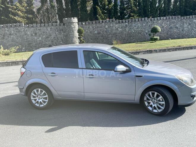 Opel Astra 2004, 244,000 km - 1.4 л - Qax