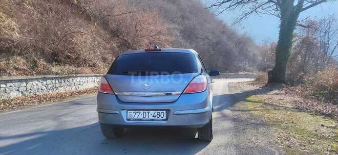 Opel Astra 2004, 244,000 km - 1.4 л - Qax