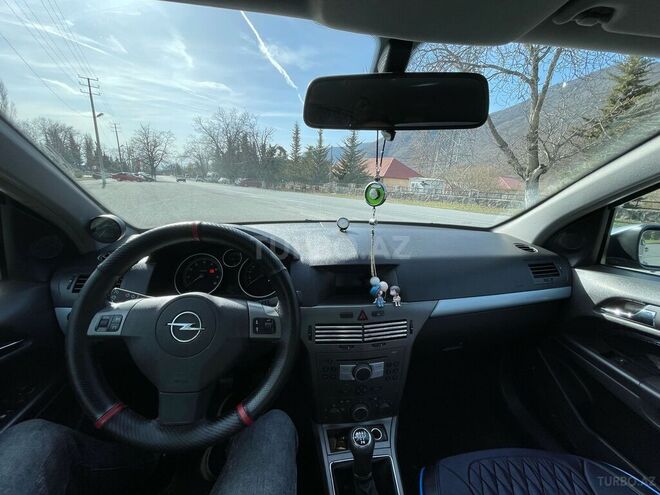 Opel Astra 2004, 244,000 km - 1.4 л - Qax
