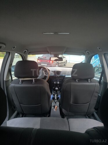Opel Astra 2010, 222,136 km - 1.4 l - Quba