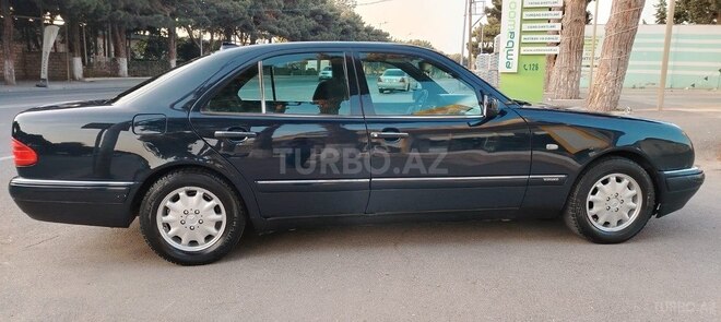 Mercedes E 230 1996, 321,456 km - 2.3 l - Bakı