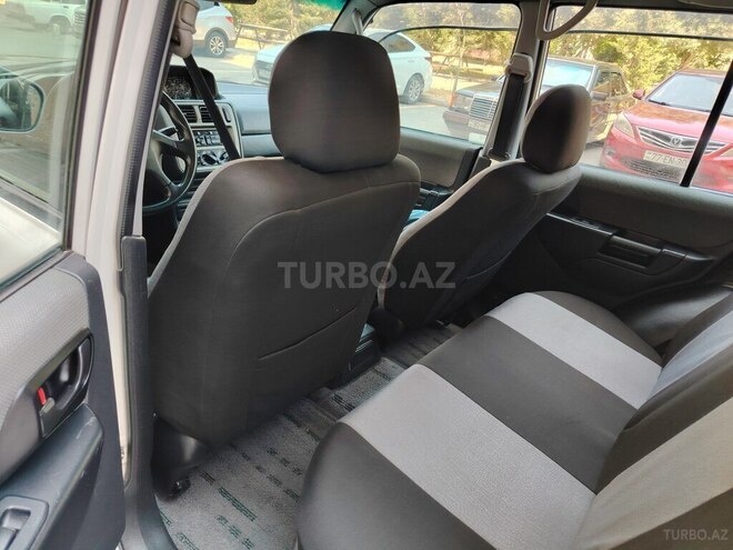 Mitsubishi Pajero io 1999, 283,000 km - 1.8 l - Bakı