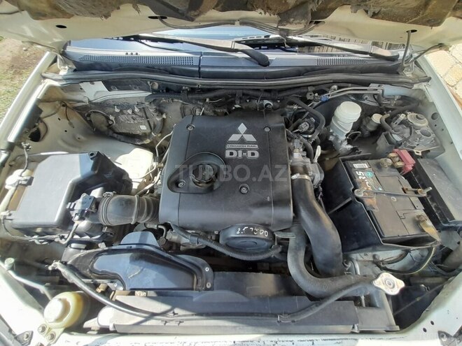 Mitsubishi L200 2011, 250,000 km - 2.5 l - Quba