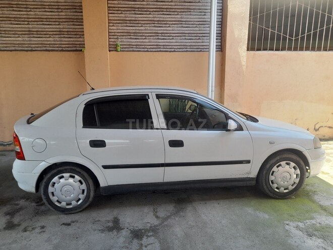 Opel Astra 2006, 320,000 km - 1.4 l - Qax