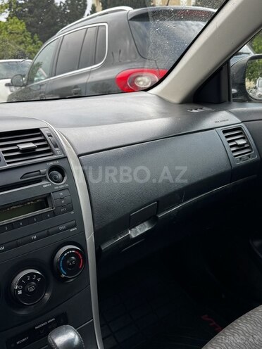 Toyota Corolla 2009, 172,000 km - 1.6 l - Bakı