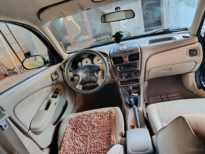 Nissan Sunny 2004, 303,000 km - 1.3 l - Biləsuvar