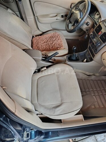 Nissan Sunny 2004, 303,000 km - 1.3 l - Biləsuvar