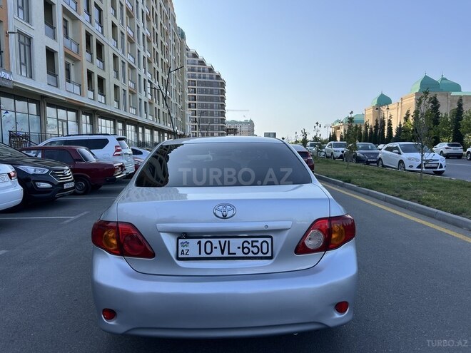 Toyota Corolla 2009, 246,341 km - 1.5 l - Bakı