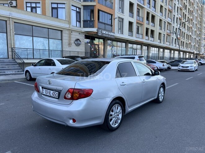 Toyota Corolla 2009, 246,341 km - 1.5 l - Bakı