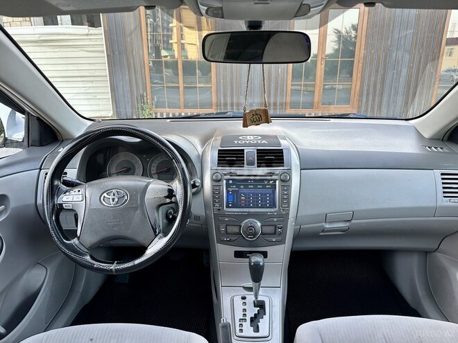 Toyota Corolla 2009, 334,580 km - 1.8 l - Bakı