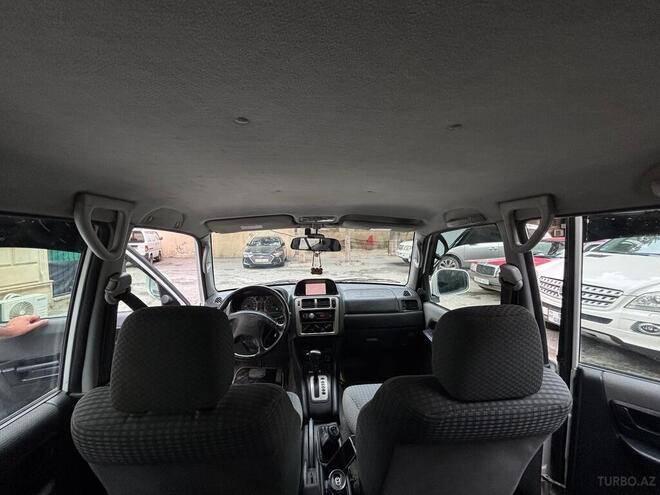Mitsubishi Pajero io 1999, 250,000 km - 1.8 л - Bakı