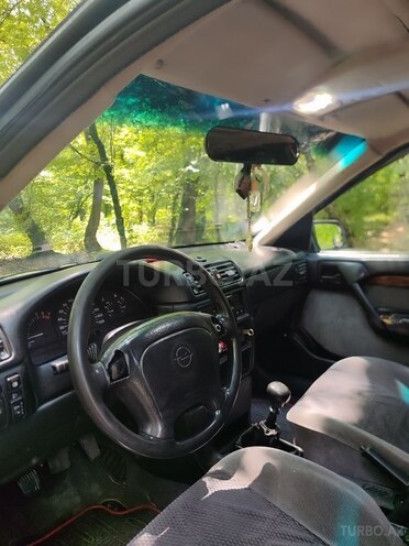 Opel Vectra 1994, 5,638,889 km - 1.8 l - Qax