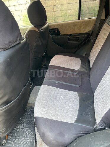 Mitsubishi Pajero io 1999, 425,372 km - 1.8 л - Bakı