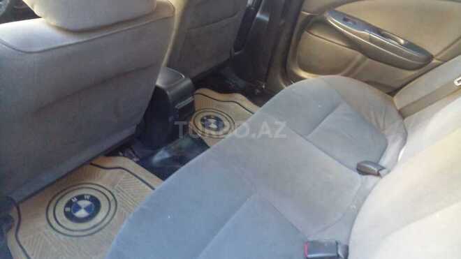 Nissan Sunny 2004, 180,000 km - 1.3 l - Bakı
