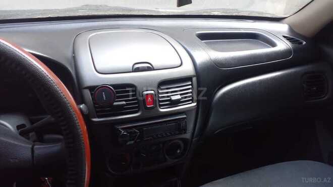 Nissan Sunny 2004, 180,000 km - 1.3 l - Bakı