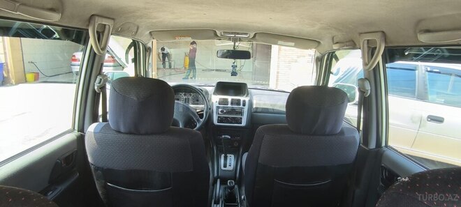 Mitsubishi Pajero io 1999, 150,000 km - 1.8 l - Xaçmaz