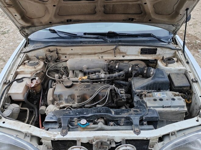 Hyundai Accent 1995, 495,000 km - 1.5 л - Qusar
