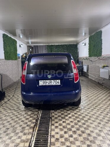 Skoda Roomster 2010, 228,000 km - 1.2 l - Bakı