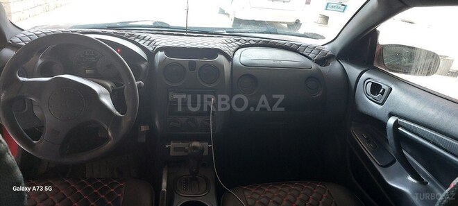 Mitsubishi Eclipse 2003, 222,222 km - 2.4 л - Şirvan
