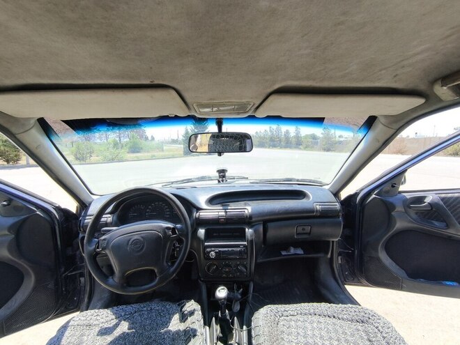 Opel Astra 1996, 401,736 km - 1.4 l - Yevlax