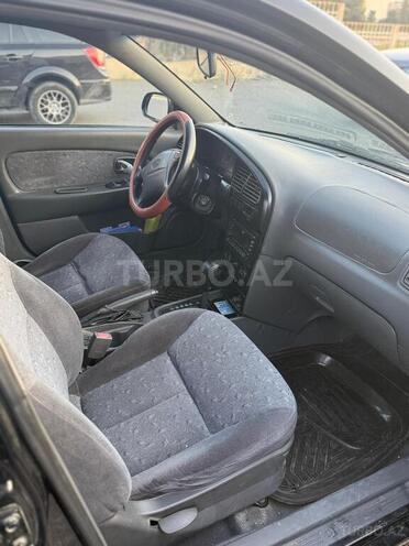 Kia  2006, 336,000 km - 1.6 л - Bakı