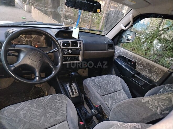 Mitsubishi Pajero io 1998, 150,000 km - 1.8 l - Bakı