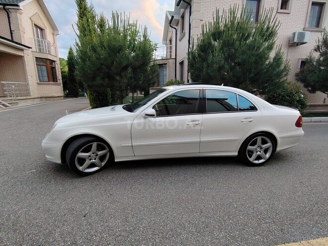 Mercedes E 280-10
