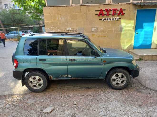 Mitsubishi Pajero io 1999, 285,000 km - 1.8 l - Bakı