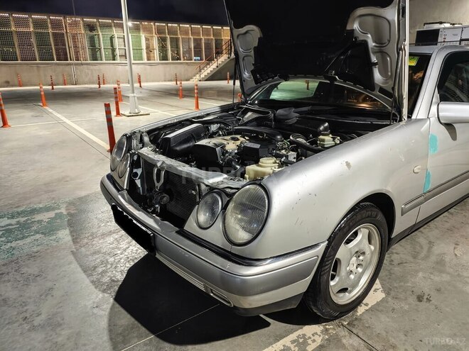 Mercedes E 230 1997, 317,128 km - 2.3 l - Bakı