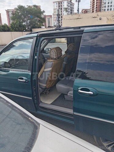 Kia Carnival 2004, 315,000 km - 2.5 l - Bakı