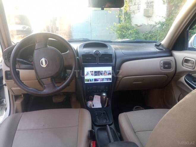 Nissan Sunny 2010, 220,000 km - 1.6 л - Bakı