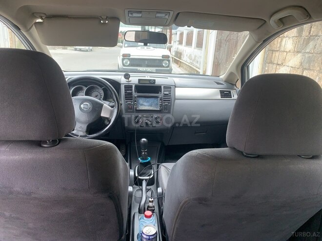Nissan Tiida 2007, 465,566 km - 1.5 л - Quba