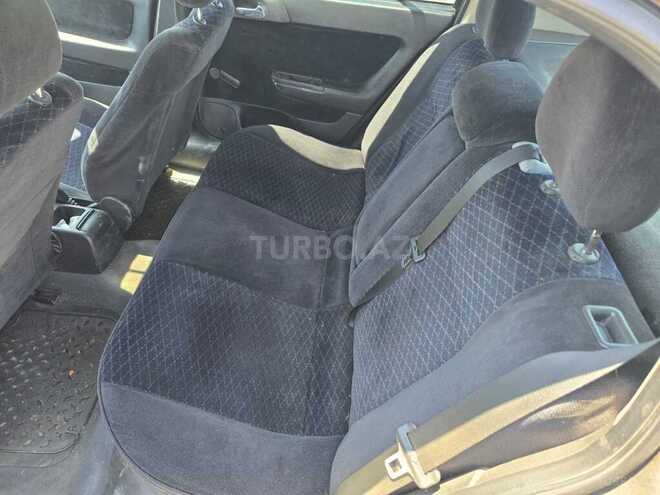 Opel Astra 2000, 335,000 km - 2.0 л - Bakı