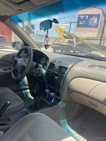 Nissan Sunny 2004, 287,000 km - 1.3 л - Bakı