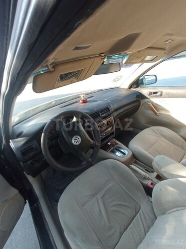 Volkswagen Passat 1997, 300,000 km - 1.8 l - Qax