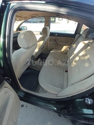 Volkswagen Passat 1997, 300,000 km - 1.8 l - Qax