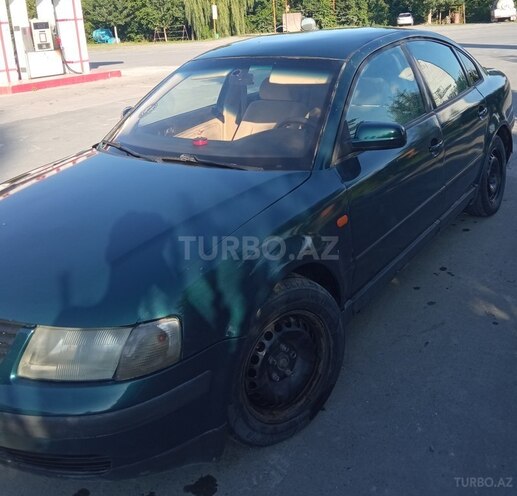 Volkswagen Passat 1997, 300,000 km - 1.8 l - Qax
